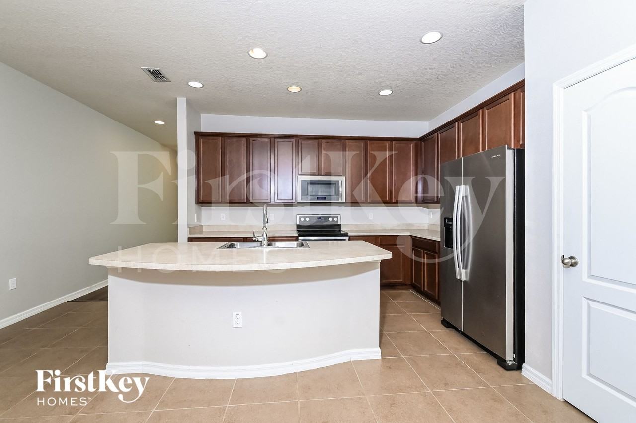 7724 Tangle Rush Dr - Photo 6 of 15