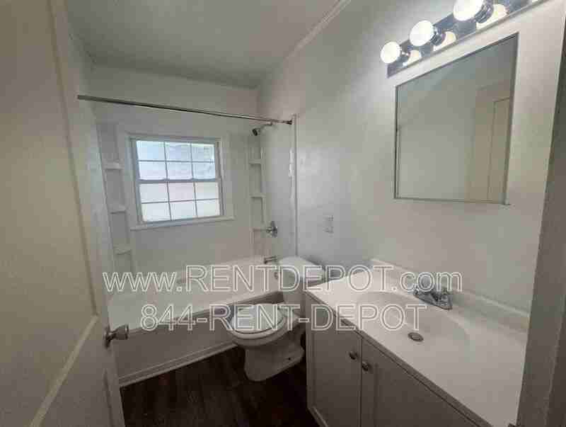 1513 Se Riverside Dr - Photo 6 of 9