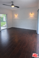 7013 Andasol Ave - Photo 5 of 8