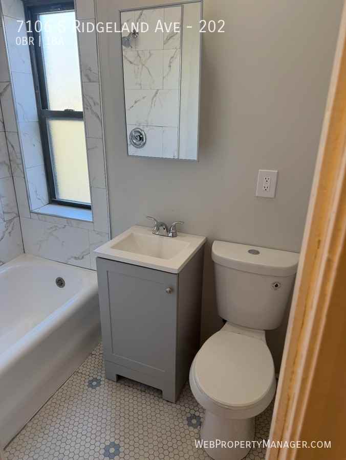 7106 S Ridgeland Ave #202 - Photo 6 of 9