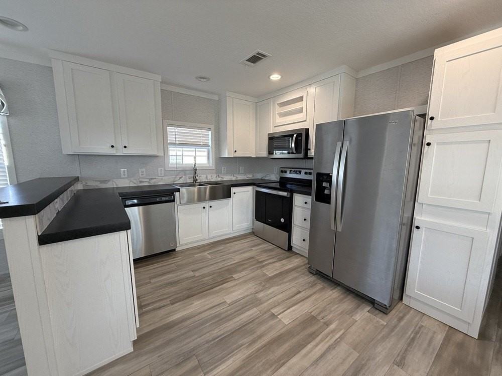 6607 Lakewood Dr Unit A #33 - Photo 3 of 20