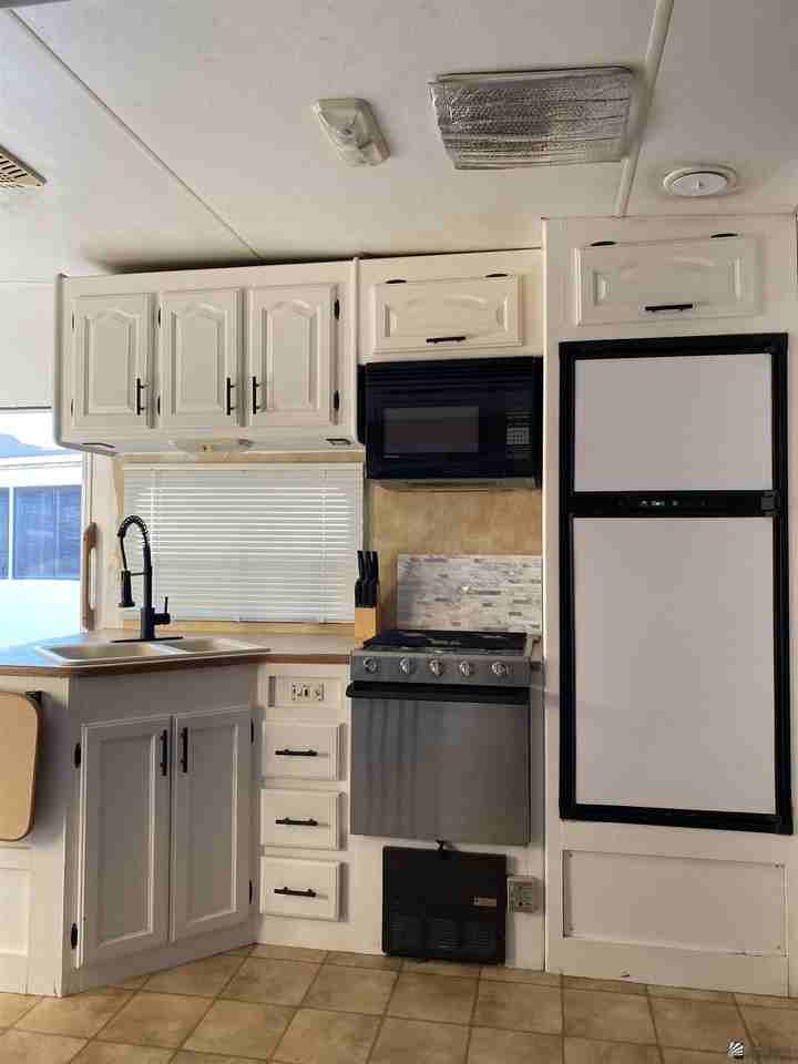 12617 E 46th Dr E 46 DR #1 - Photo 2 of 22