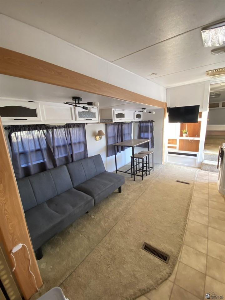 12617 E 46th Dr E 46 DR #1 - Photo 4 of 22