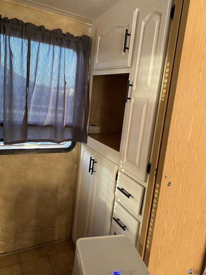 12617 E 46th Dr E 46 DR #1 - Photo 6 of 22