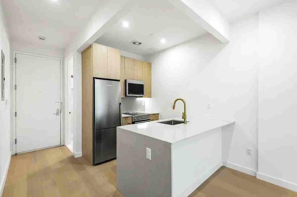 221 E 23rd St #7-8 - Photo 6 of 9