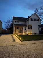 featured image of 115 W 6th St