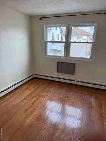 11651 Farmers Blvd Apt 2 - Photo 2 of 5