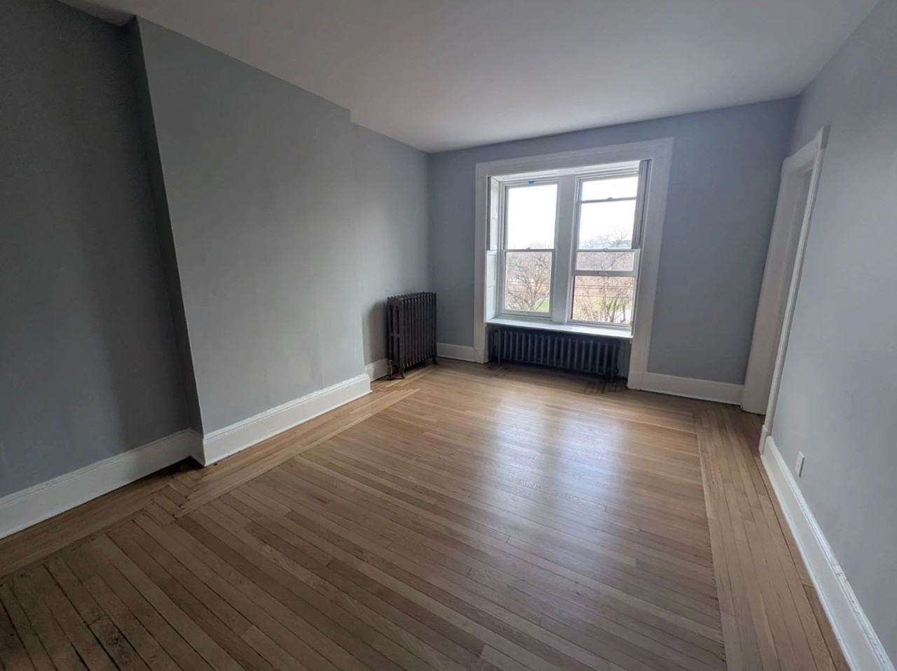 Renovated Apartment in Prime Center Square – Walk to Washington Park! - Photo 6 of 8