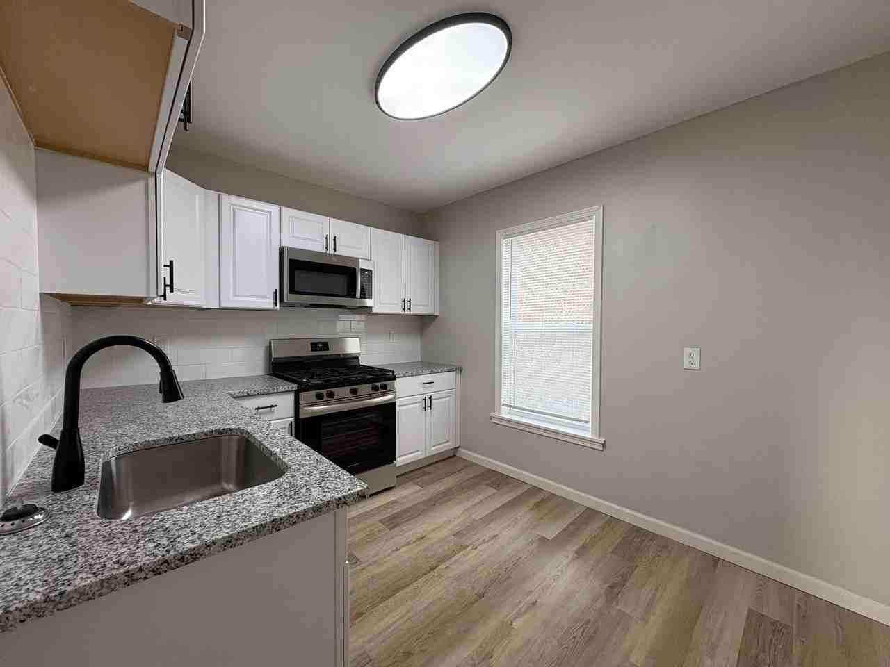 7027 Plateau Ave - Photo 6 of 13