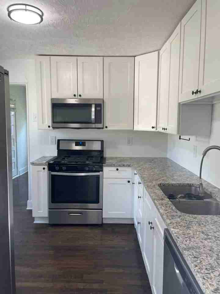 1125 E 84th Ter - Photo 6 of 18