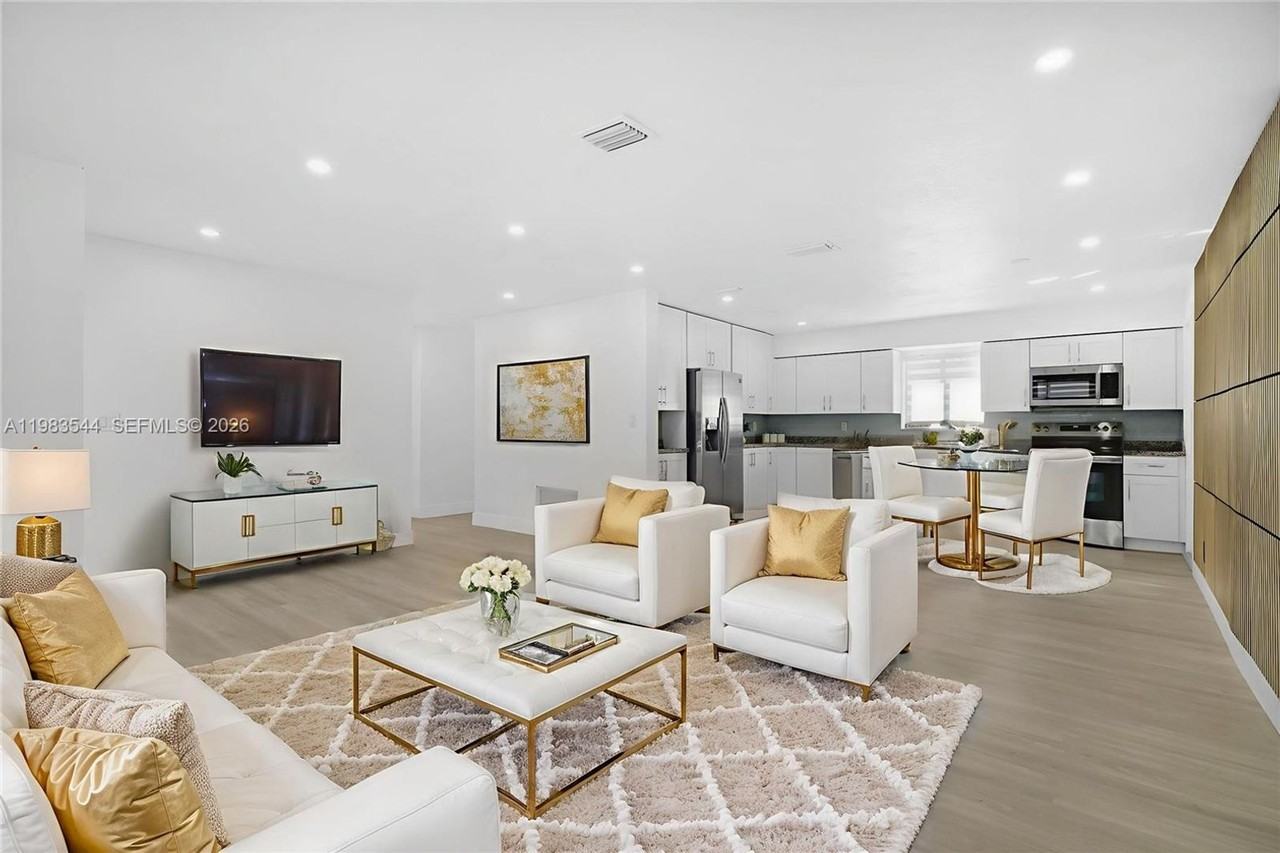 7501 Raleigh St - Photo 3 of 15