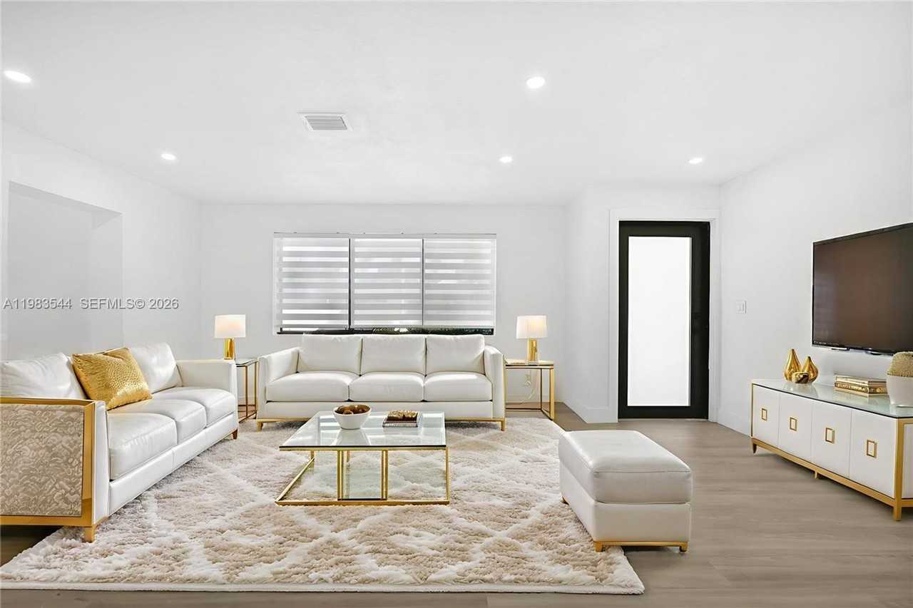 7501 Raleigh St - Photo 4 of 15