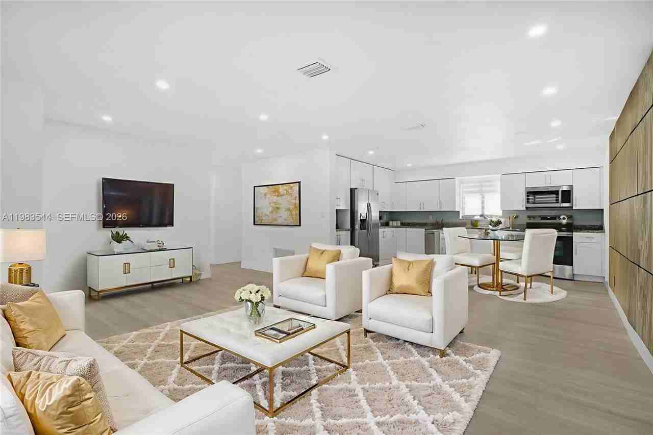 7501 Raleigh St - Photo 5 of 15