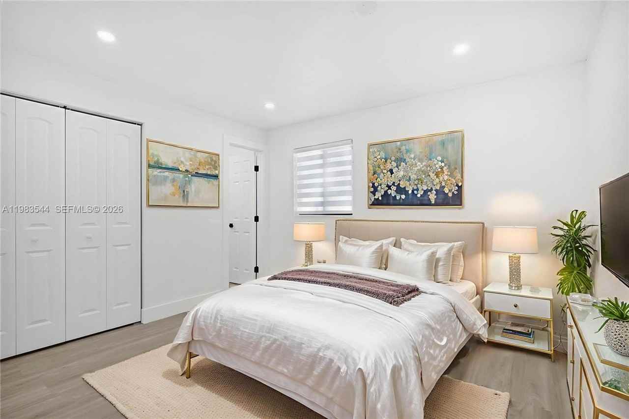 7501 Raleigh St - Photo 7 of 15