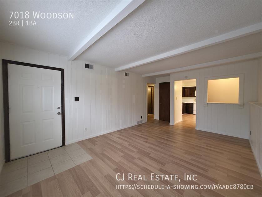 7018 Woodson Rd - Photo 2 of 11