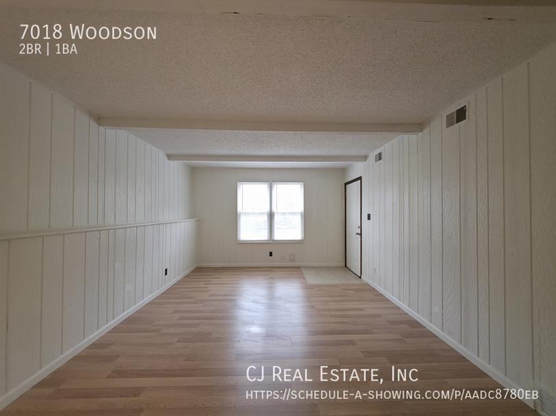 7018 Woodson Rd - Photo 3 of 11