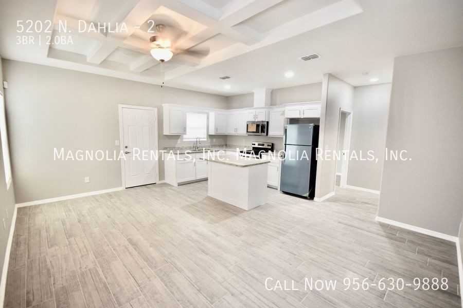 5202 N Dahlia St #2 - Photo 3 of 14