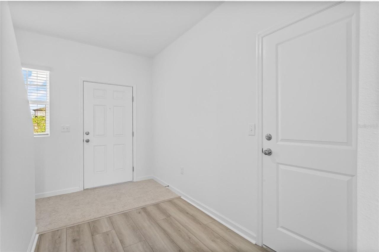 5948 Piney Shrub Pl - Photo 4 of 26