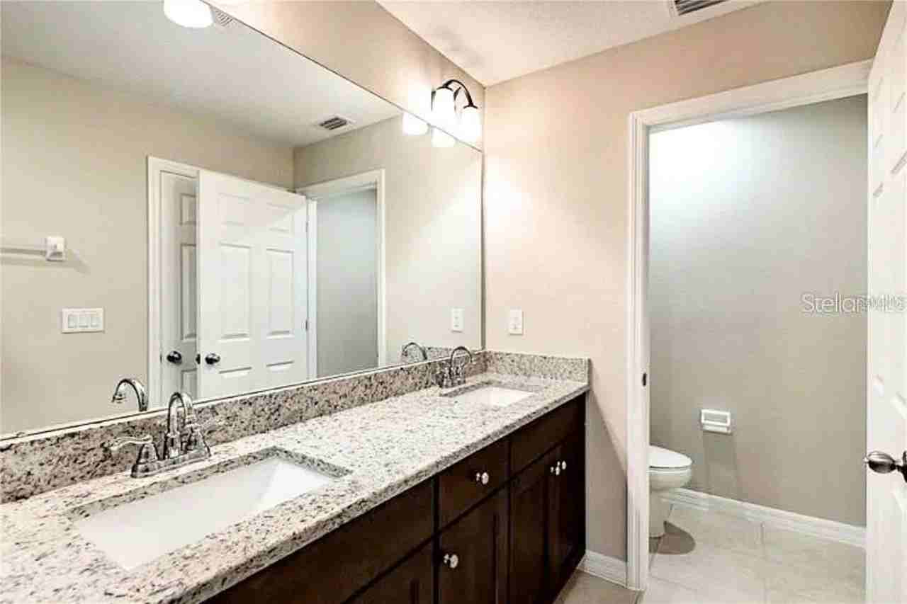 6320 Tillandsia Pl - Photo 3 of 4