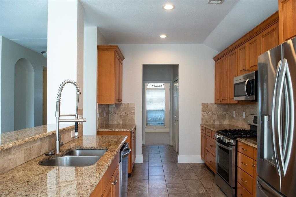 7710 Calypso Dr - Photo 3 of 19