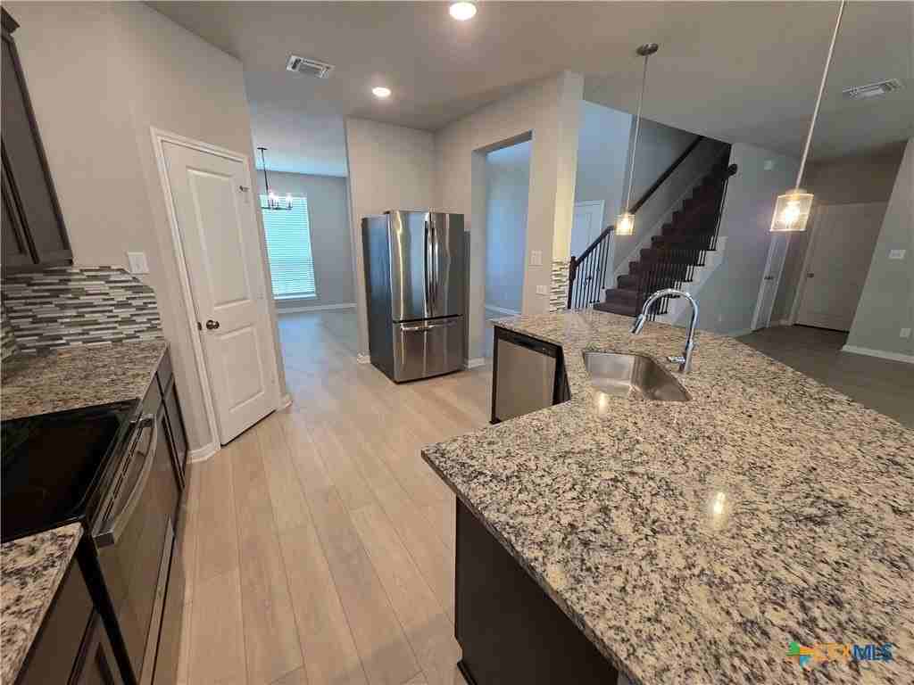 10001 Kensley Rose Dr - Photo 6 of 22