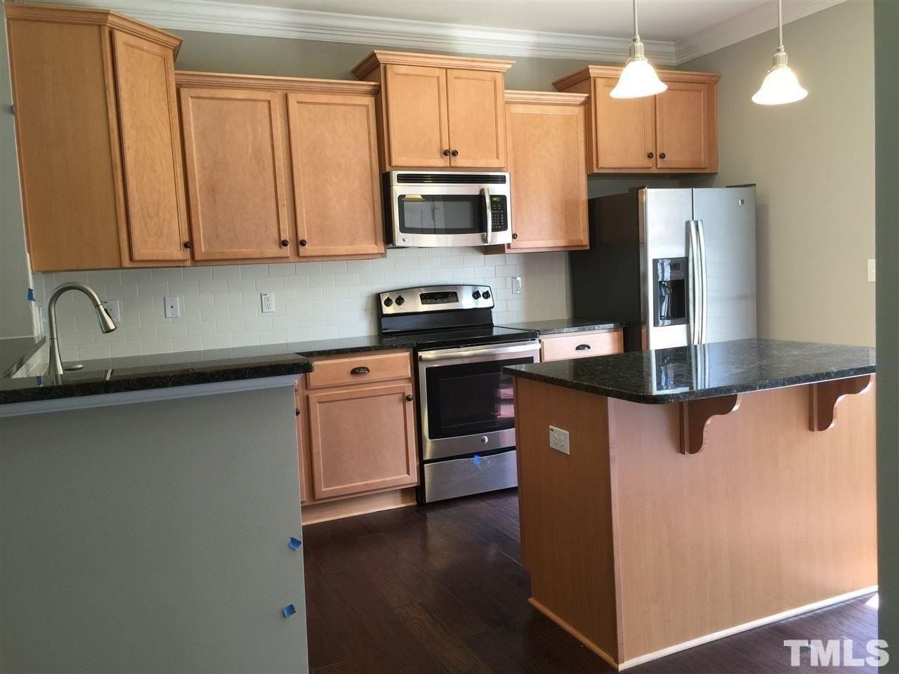 1401 Town Home Dr - Photo 3 of 31