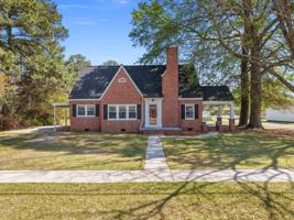 featured image of 302 W Main St