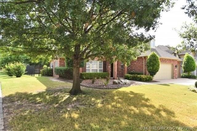 8239 S 70th East Ave - Photo 3 of 36