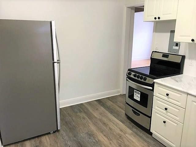 Brownstone on Brick - Photo 3 of 7