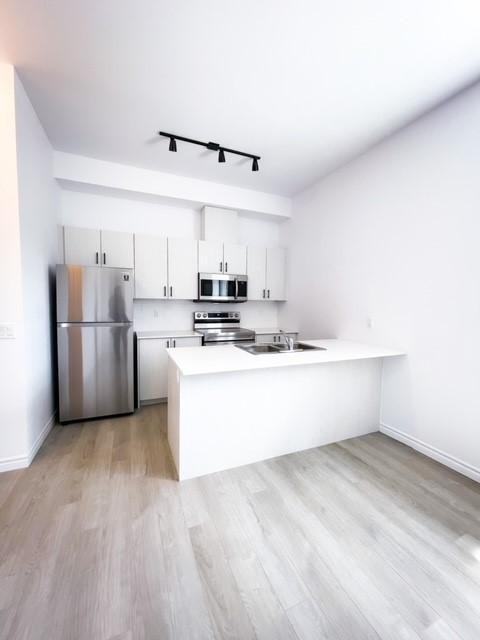 McGee Apartments - Photo 6 of 9