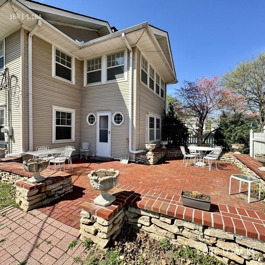 411 W 60th Ter - Photo 2 of 23