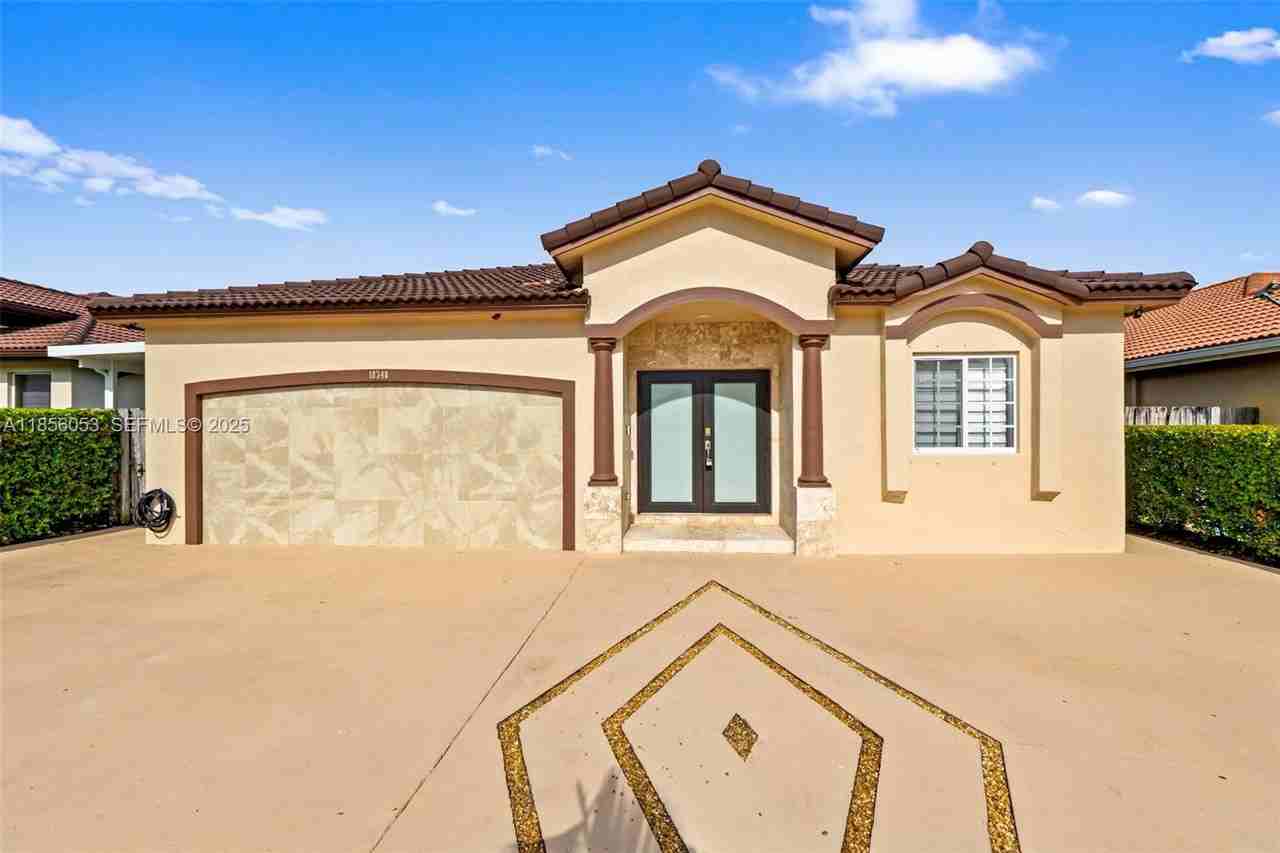 9590 Northwest 24th Place #9590 - Photo 2 of 7