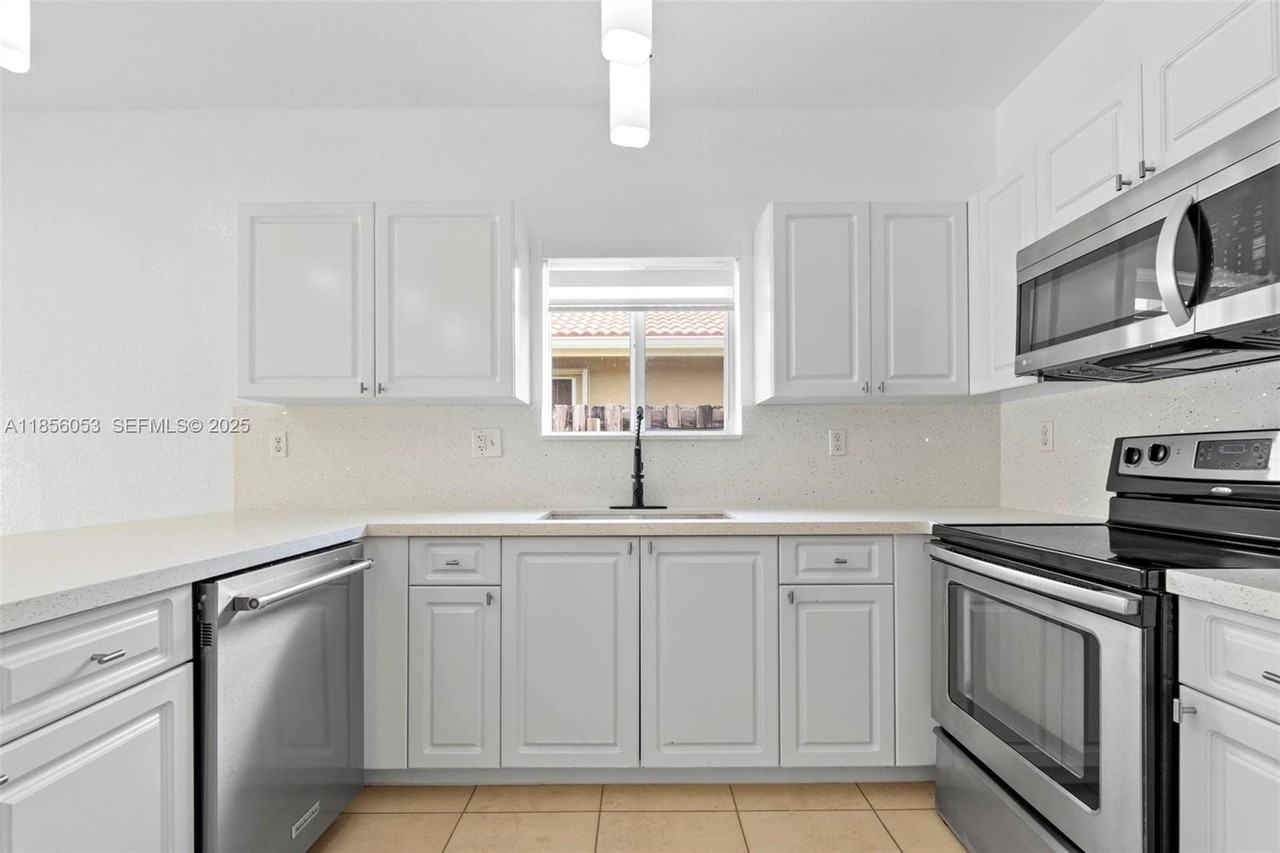 9590 Northwest 24th Place #9590 - Photo 6 of 7