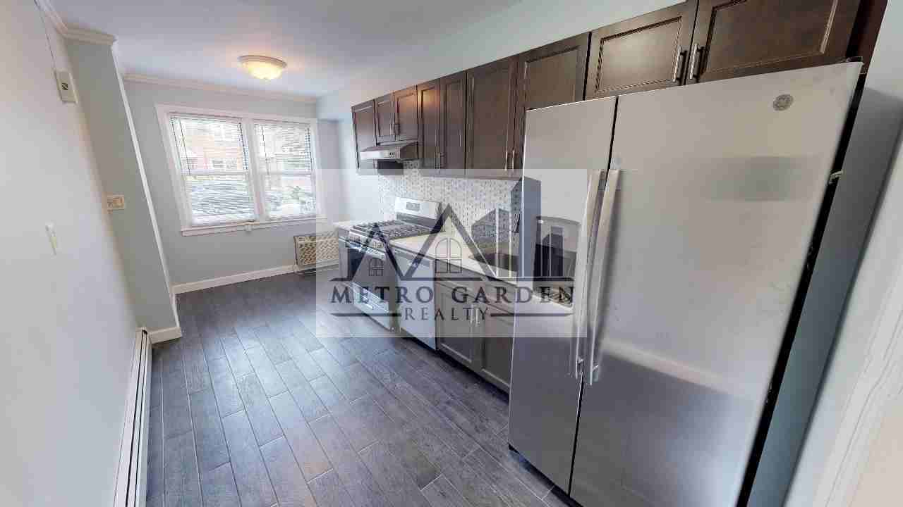 67-12 Juno Street - Photo 5 of 31