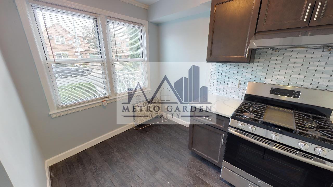 67-12 Juno Street - Photo 6 of 31