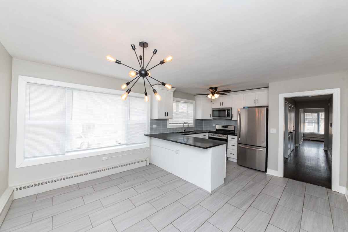 3058 N Kostner Ave #1E - Photo 2 of 17