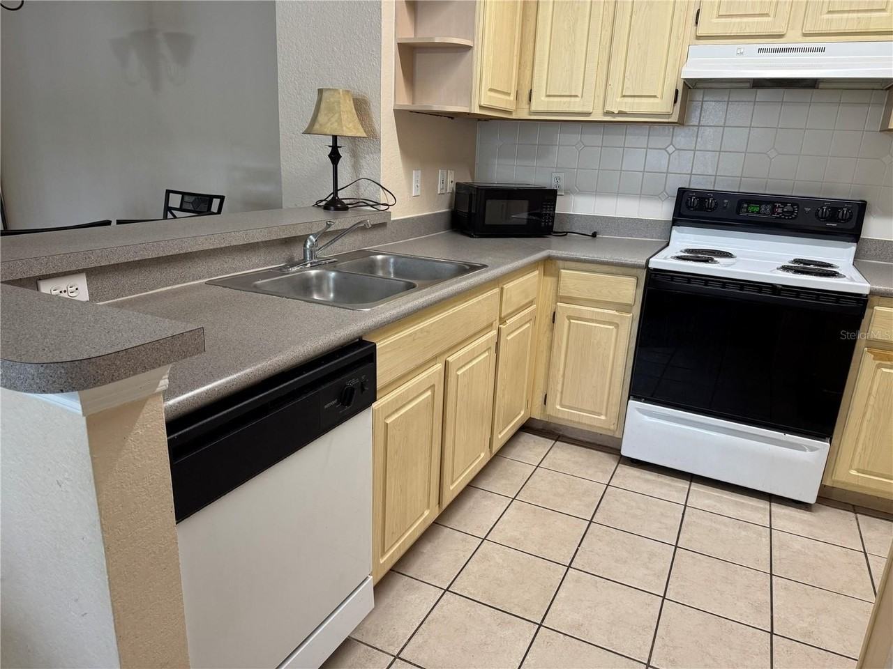 8908 Legacy Ct #16-103 - Photo 2 of 50