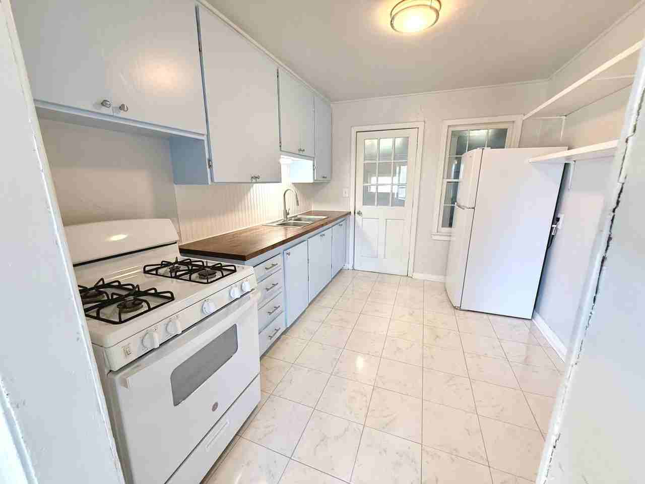 5209 N Mueller Ave - Photo 3 of 10