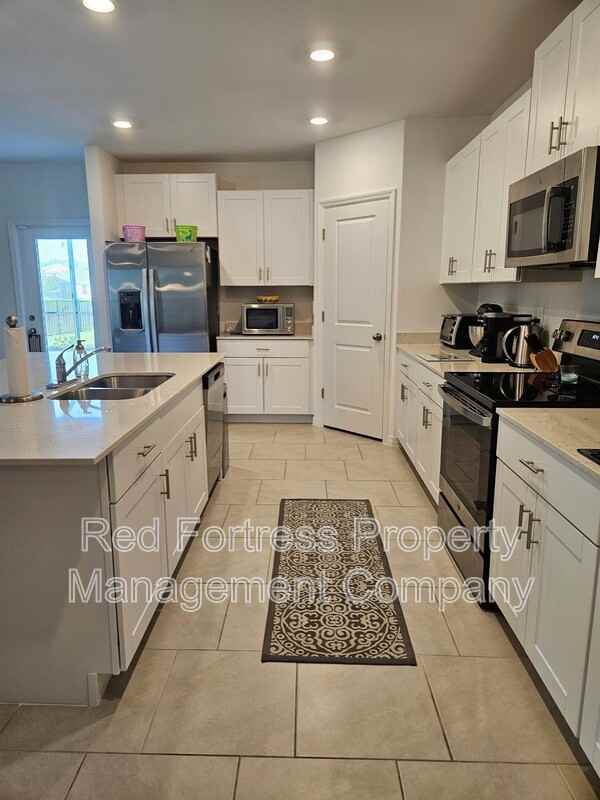 12210 Dakota Ridge Pl - Photo 3 of 20