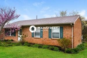 featured image of 1303 Woodcreek Dr