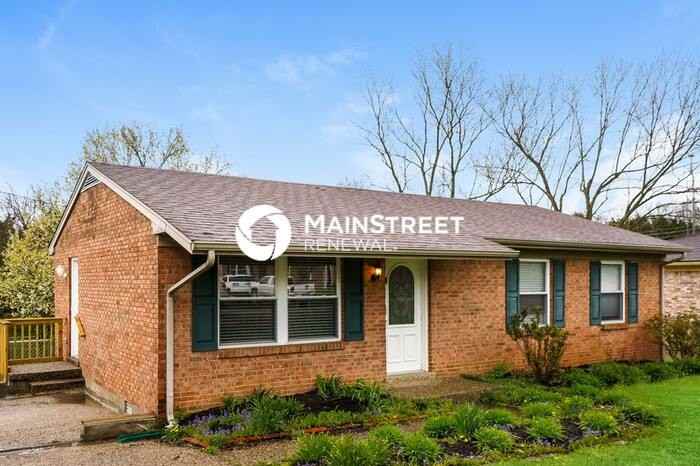 1303 Woodcreek Dr - Photo 2 of 15