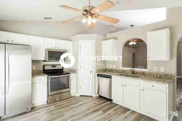 10401 Opus Dr - Photo 6 of 15