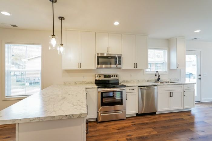 658 19th Ave W - Photo 6 of 14