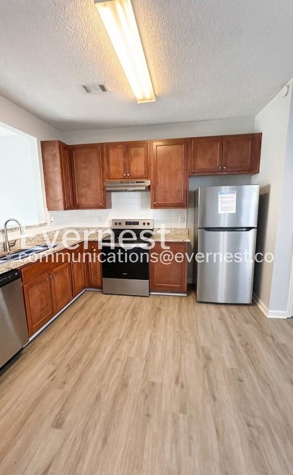 8610 Thomas Ln - Photo 2 of 26