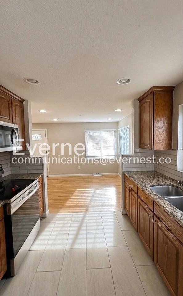 4185 S Inca St - Photo 4 of 12