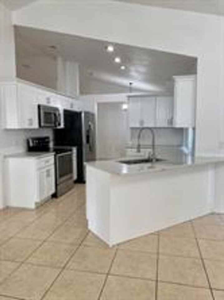 1551 Ortega Ave - Photo 5 of 18