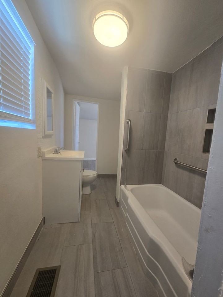 128 E 4th St - Photo 4 of 16