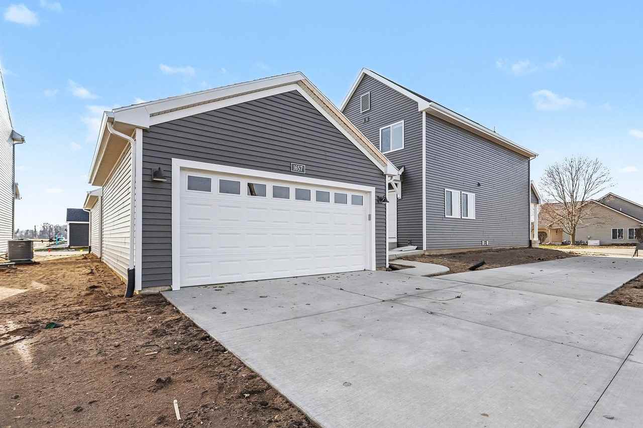 6138 Aurelius Rd - Photo 2 of 23