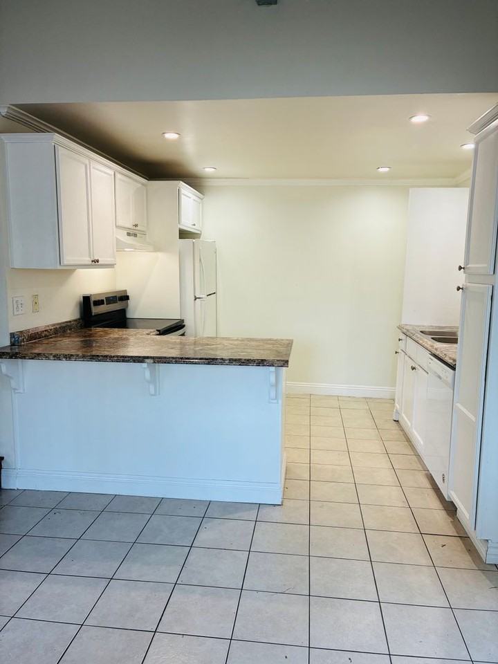 1195 Temple Ave #1 - Photo 4 of 31