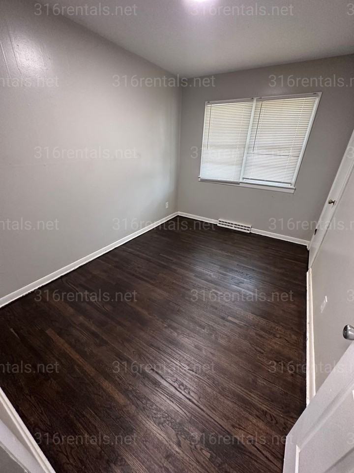 1121 E 61st St N - Photo 3 of 12